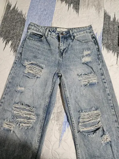 Jeans desgastados azul claro - miniatura 1