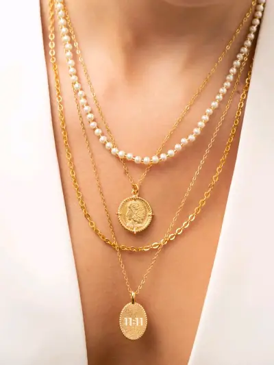 Collares dorados con perlas - miniatura 1