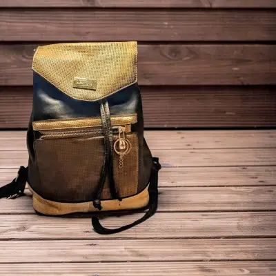 Mochila negra y crema - miniatura 1