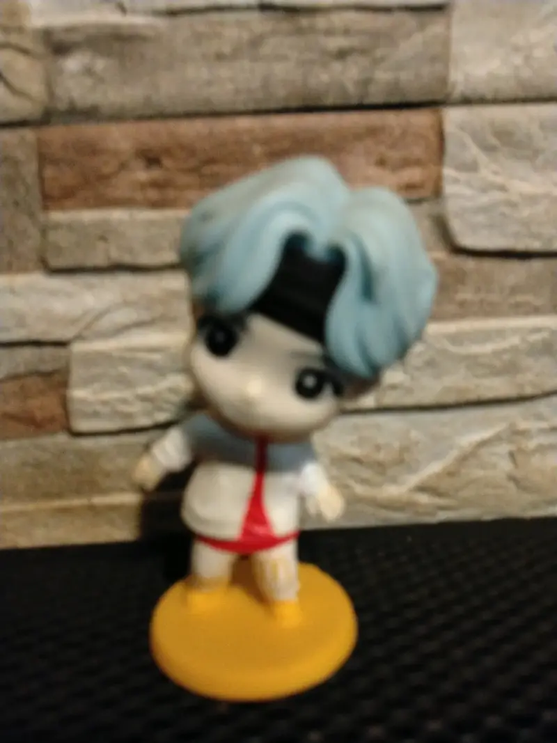 Figura coleccionable miniatura - 1