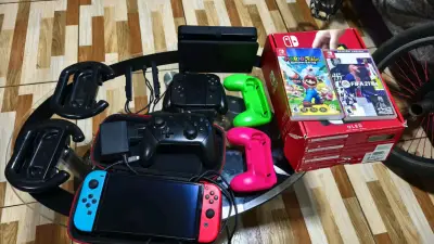 Nintendo Switch OLED con juegos - miniatura 1