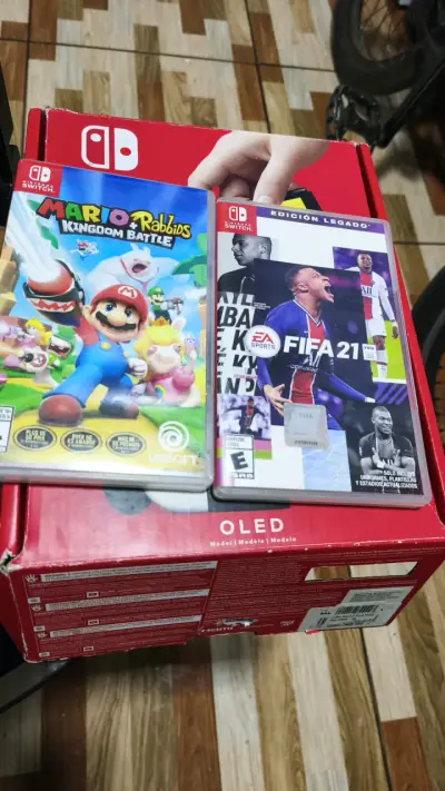 Nintendo Switch OLED con juegos - miniatura 4