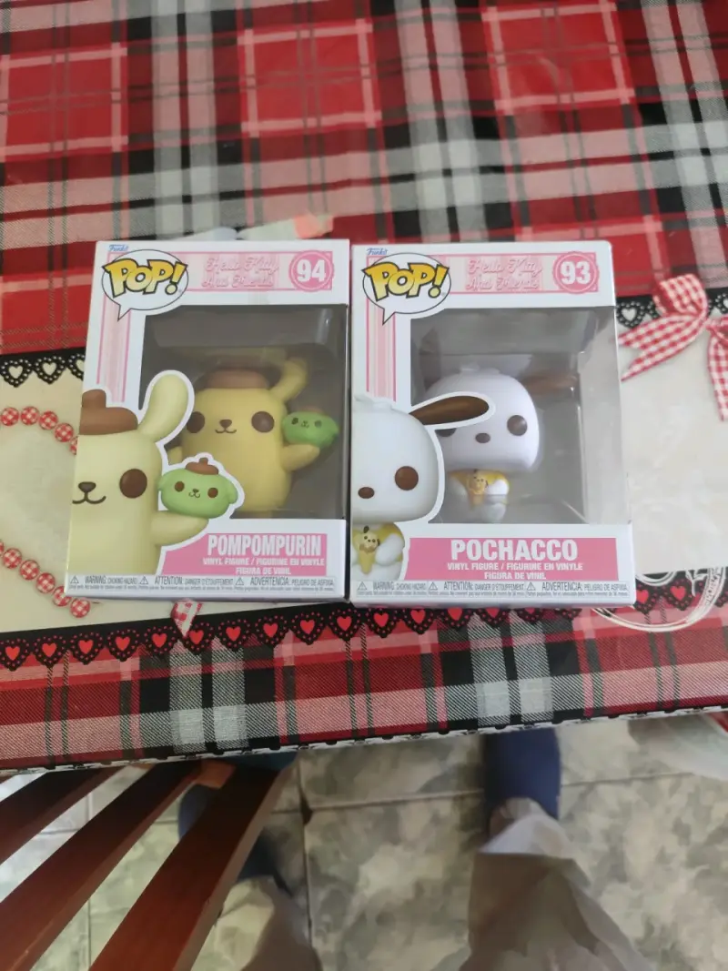 Figuras Funko Pop Sanrio de Pompompurin y Pochacco - 1