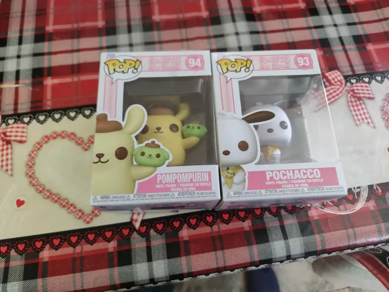 Figuras Funko Pop Sanrio de Pompompurin y Pochacco - 2