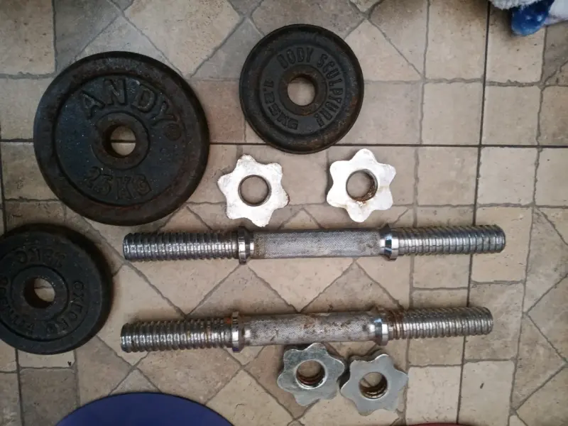 Juego de mancuernas y pesas