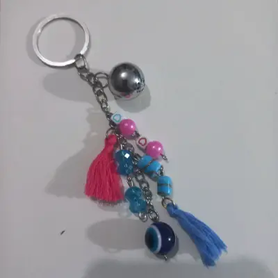 Llavero con borlas y cuentas coloridas - miniatura 1