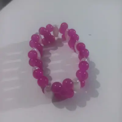 Pulsera elástica de cuentas rosas - miniatura 1