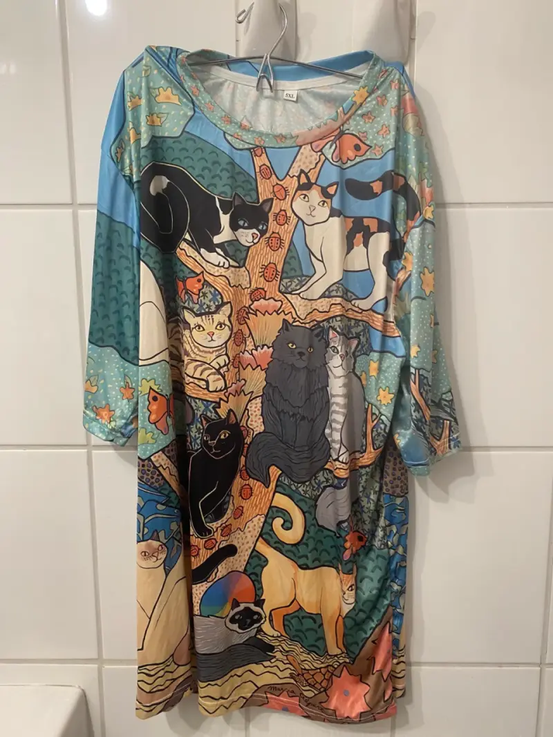 Polera estampado de gatos