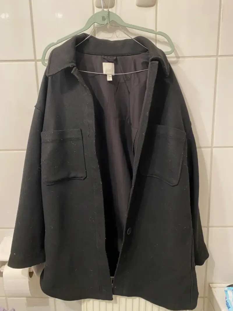 Chaqueta H&M negra elegante