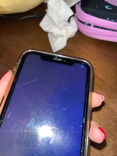iPhone XR con batería al 100% - miniatura 3