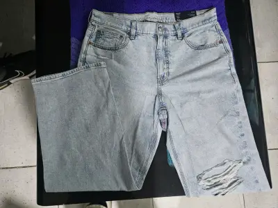 Jeans desgastados claros - miniatura 1