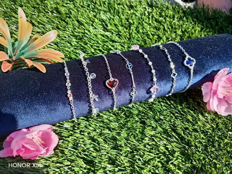Pulseras de plata con dijes