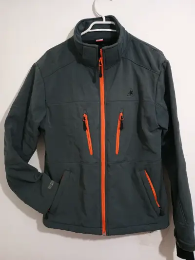 Chaqueta deportiva gris con detalles naranjas - miniatura 1
