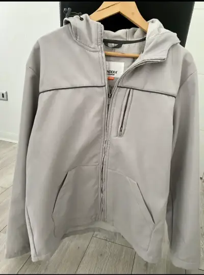 Chaqueta gris con capucha - miniatura 1