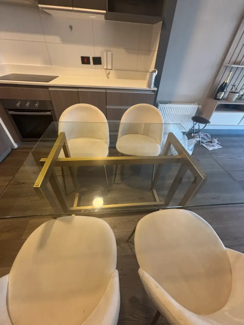 Juego de comedor dorada vidrio y acero - 1