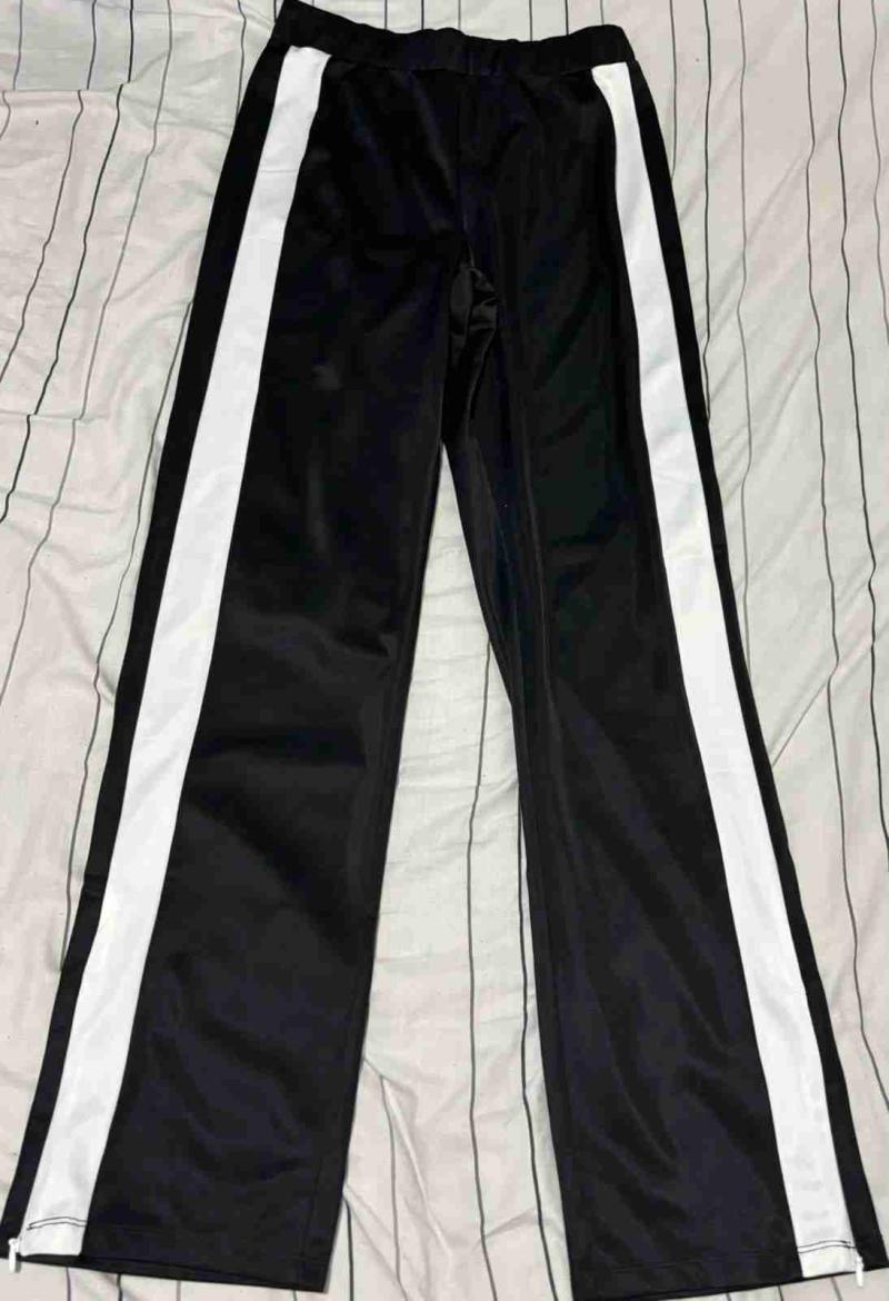 Pantalones deportivos negros con franjas - 1