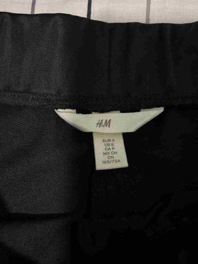 Pantalones deportivos negros con franjas - miniatura 2