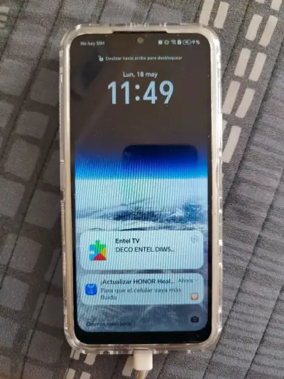 Teléfono celular con funda transparente - miniatura 3