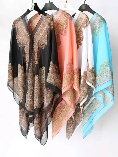 Ponchos de colores variados - miniatura 1