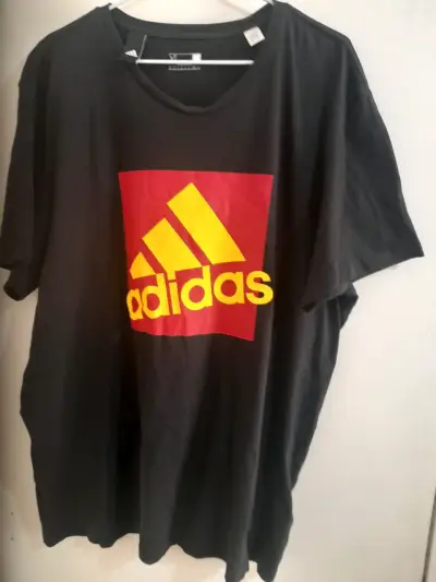 Polera negra Adidas con logo - miniatura 1