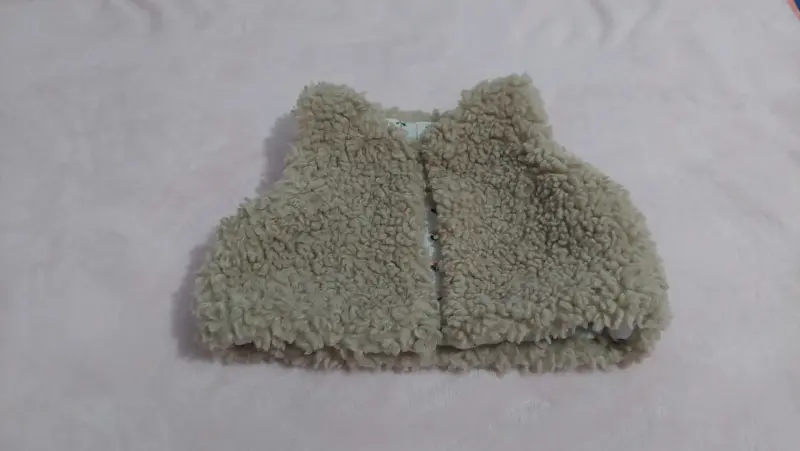 Chaqueta sin mangas para bebé
