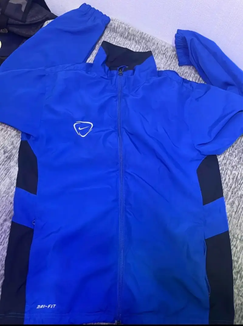 Cortavientos Nike Dri-Fit azul - 1