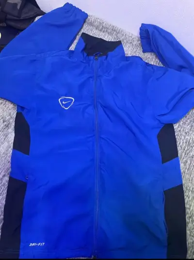 Cortavientos Nike Dri-Fit azul - miniatura 1
