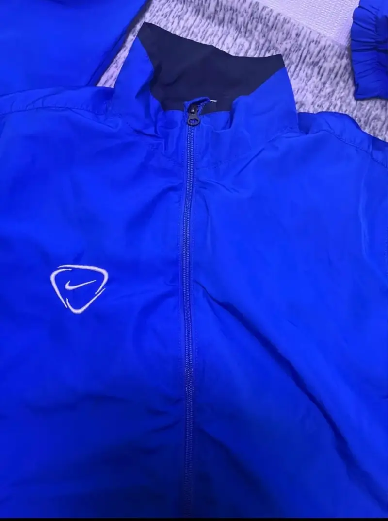 Cortavientos Nike Dri-Fit azul - 2