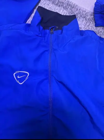 Cortavientos Nike Dri-Fit azul - miniatura 2