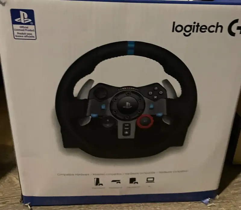 Consola PS4 con juegos y volante - 3