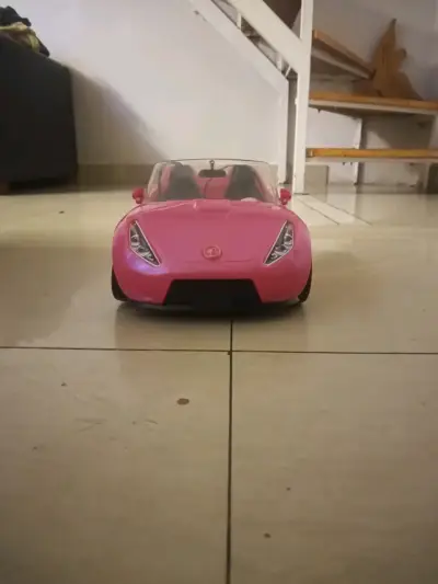 Auto de juguete rosa convertible - miniatura 1