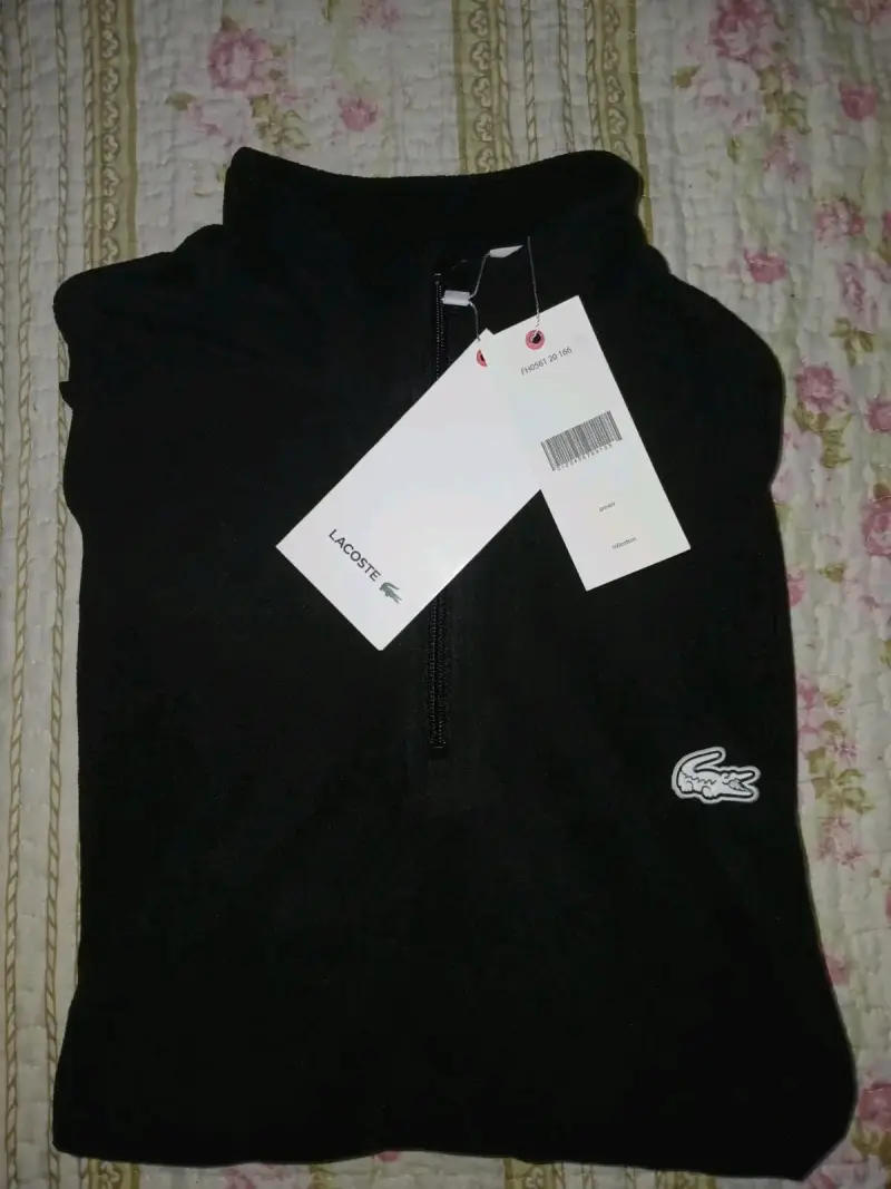 Polerón negro con cierre Lacoste