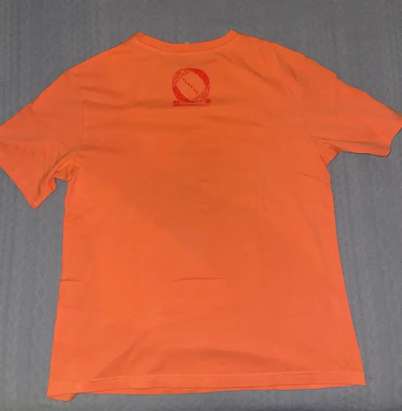 Polera H y M naranja con diseño skate - 2