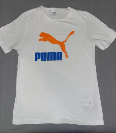 Polera Puma blanca con logo naranja - miniatura 1