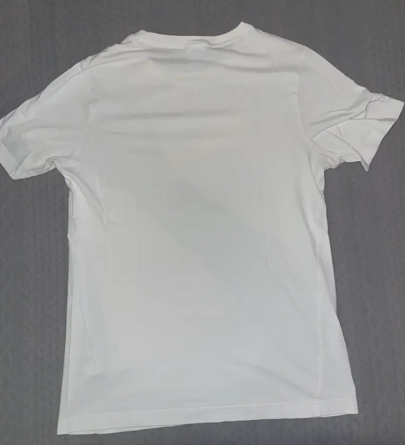Polera Puma blanca con logo naranja - 2
