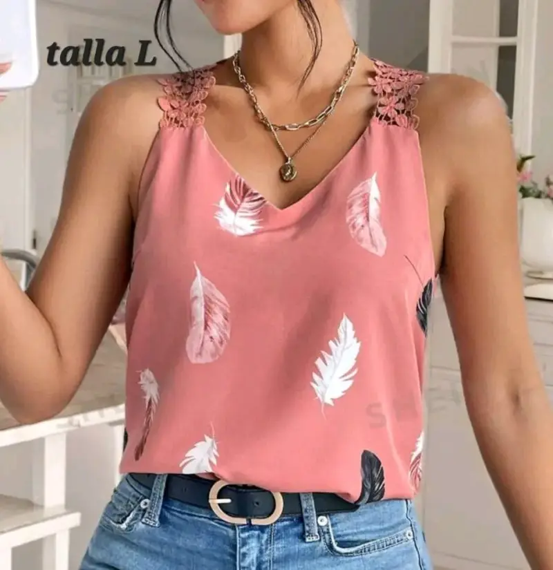 Polera sin mangas con estampado de plumas - 1