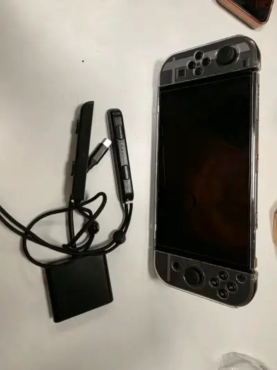 Nintendo switch Oled - miniatura 4