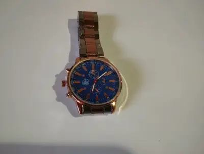 Reloj de pulsera dorado y azul - miniatura 2