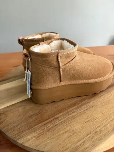 Botines de cuero marrones con piel. - miniatura 1