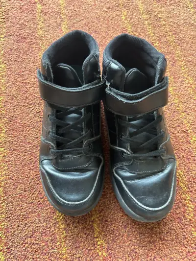 Botines negros de cuero - miniatura 1
