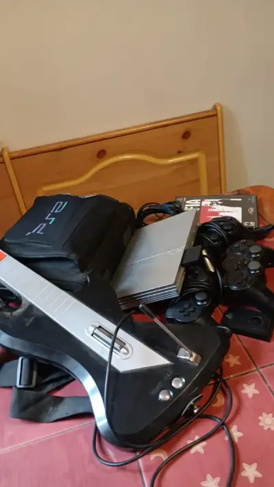 Pack Playstation2 Slim Silver+Bolso+Guitar Hero - miniatura 2