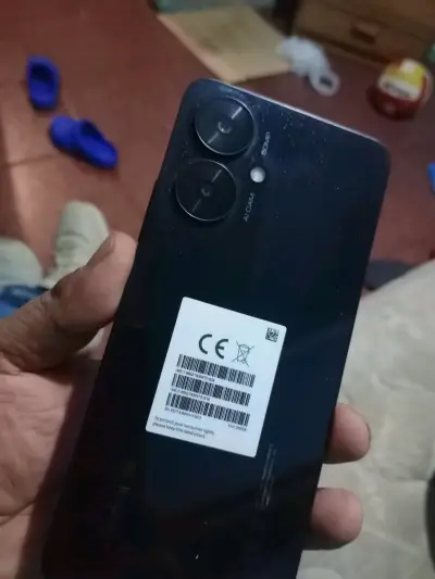 Smartphone negro con doble cámara redmi 13 c - miniatura 1