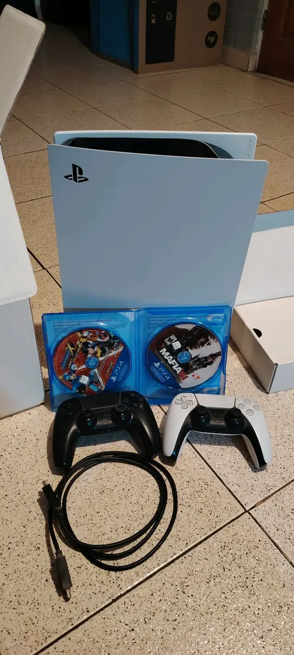 Consola PS5 con mandos y juegos - 1