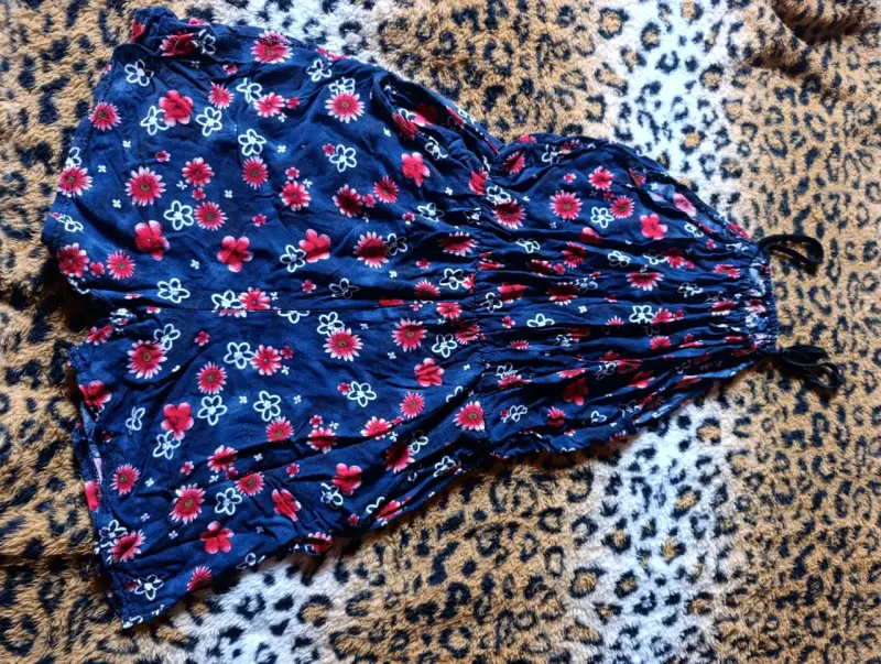Enterito floral azul con tirantes