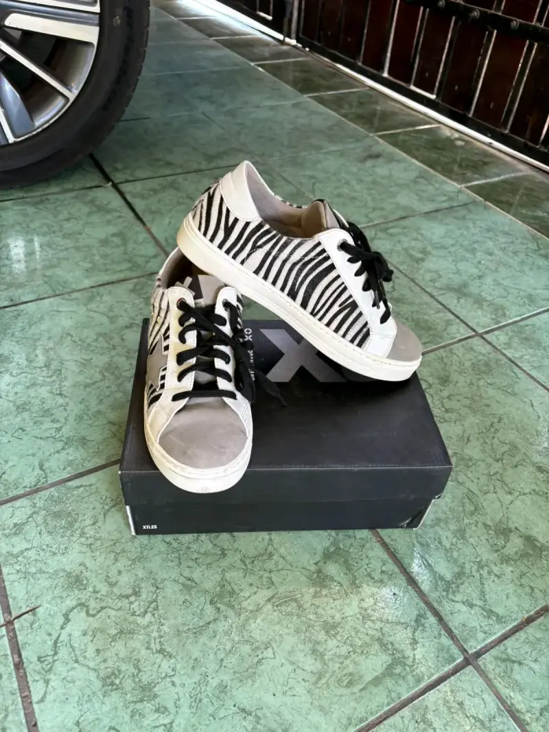 Zapatillas con estampado cebra