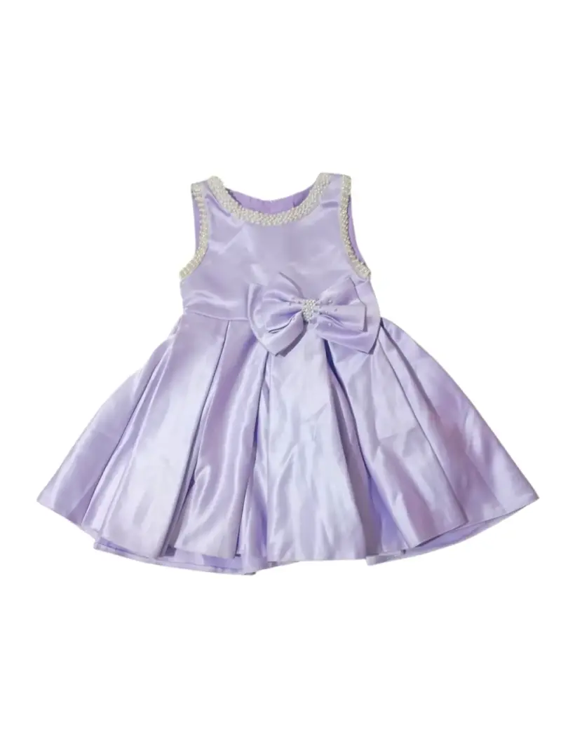 Vestido de niña lila con lazo