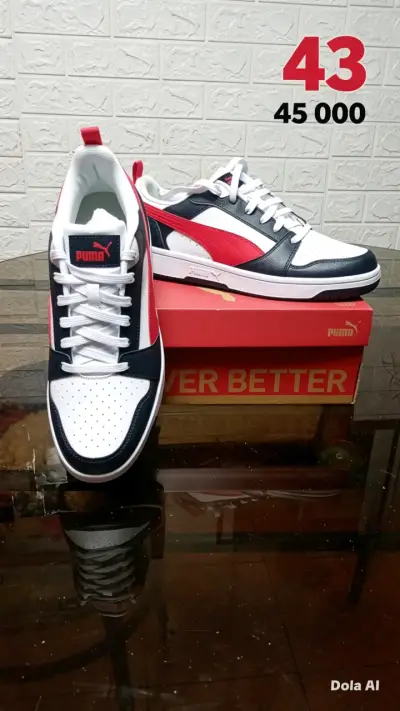 Zapatillas Puma blancas y rojas - miniatura 1