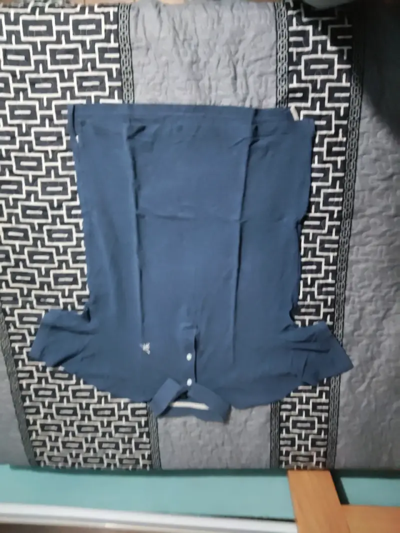 Polera polo azul oscuro - 1