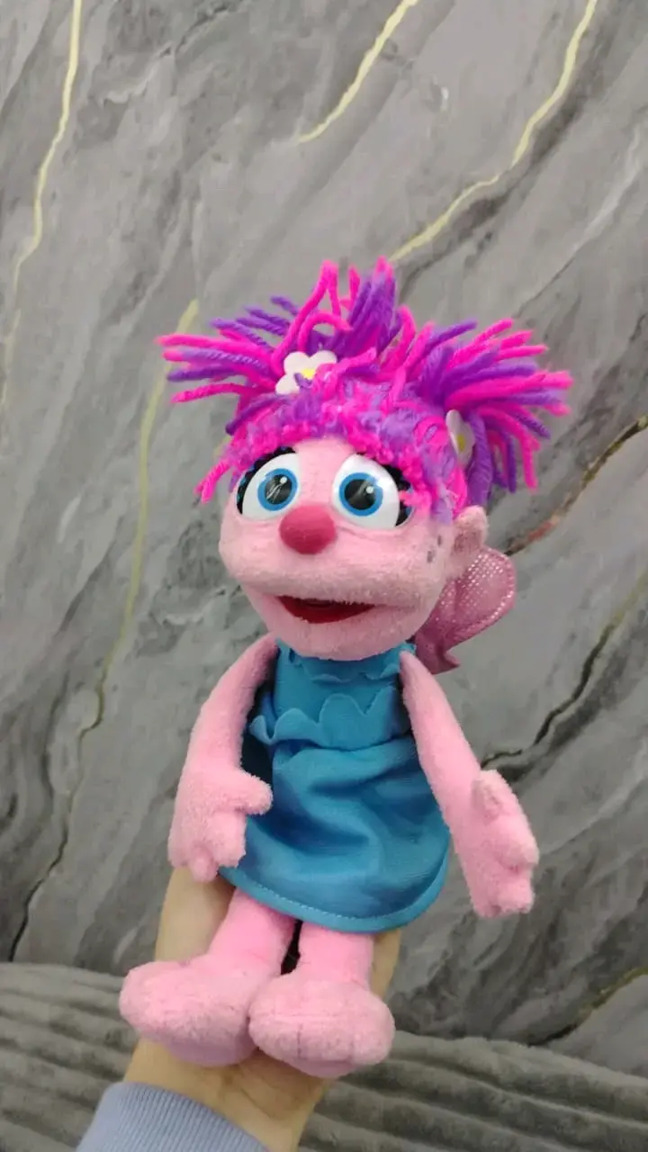 Muñeco de peluche rosa