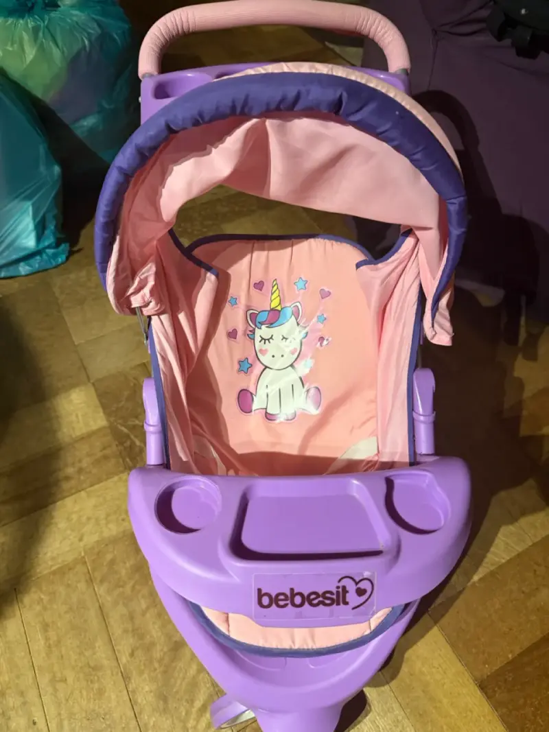 Coche de muñecas rosa Bebesit